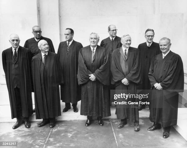 Full-length group portrait of U.S. Supreme Court Justices : John M. Harlan, Hugo L. Black, Chief Justice Warren E. Burger, William O. Douglas,...
