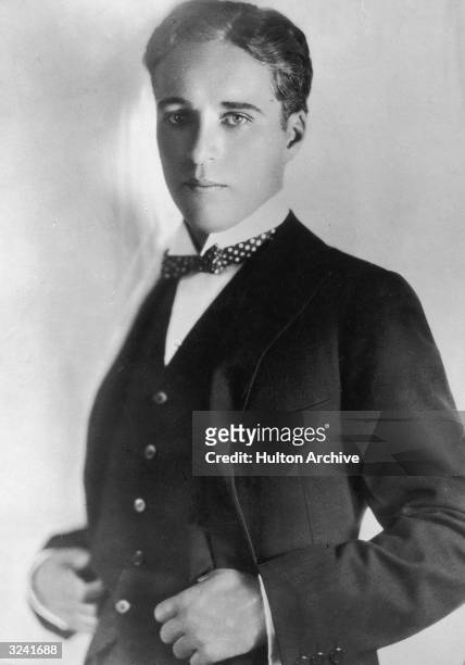 Studio portrait of British-born actor and filmmaker Charlie Chaplin as a young man.