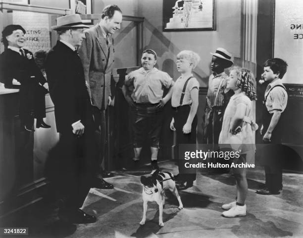 George McFarland as Spanky, Billy Laughlin as Froggy, Billie Thomas as Buckwheat, Janet Burston and Robert Blake as Mickey Gubitosi, in a still from...