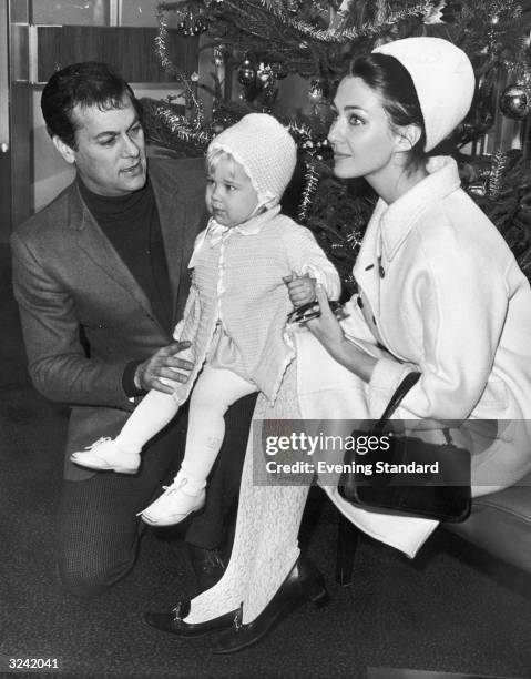 American actor Tony Curtis with his wife Christine Kaufmann and their daughter Alexandra.