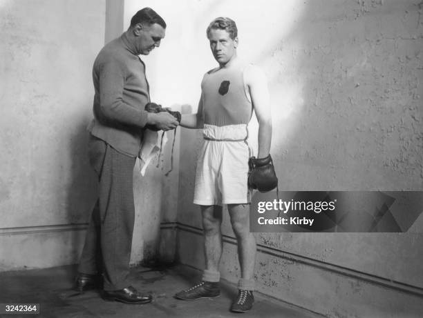 The Marquis of Clydesdale with his trainer Dick Smith during the amateur boxing championships at Alexandra Palace.