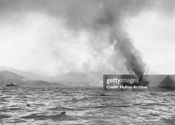 British ship on fire in Bougie Harbour , during the North African 'torch' landings. The Luftwaffe bombed three of the Allied ships as they attempted...