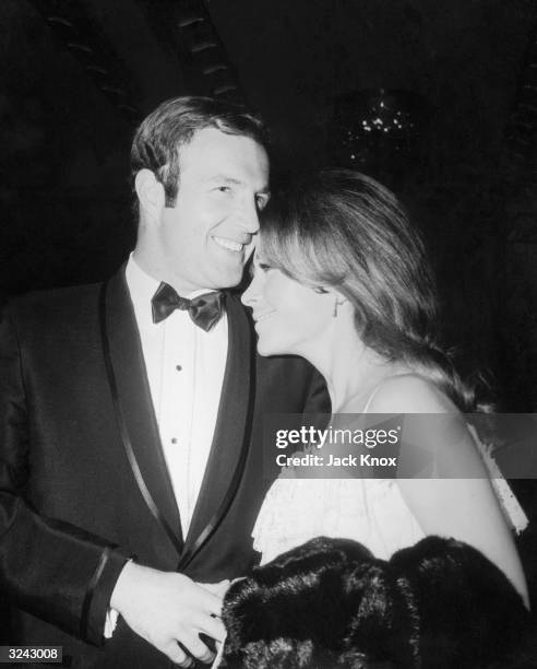 American actor James Caan and Michelle Carey attend Jack Jones's opening at Coconut Grove, Los Angeles, California.