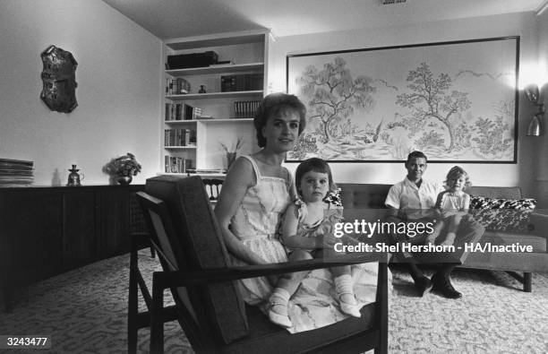 Marina Oswald Porter, former wife of Lee Harvey Oswald, accused assassin of President John F Kennedy, sits in her living room with her second...