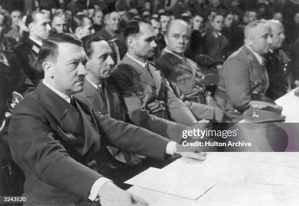 German dictator Adolf Hitler , Minister of Propaganda Joseph Goebbels , Nazi deputy Rudolf Hess , Dr. Robert Ley , SS leader Hans Lammers and an...