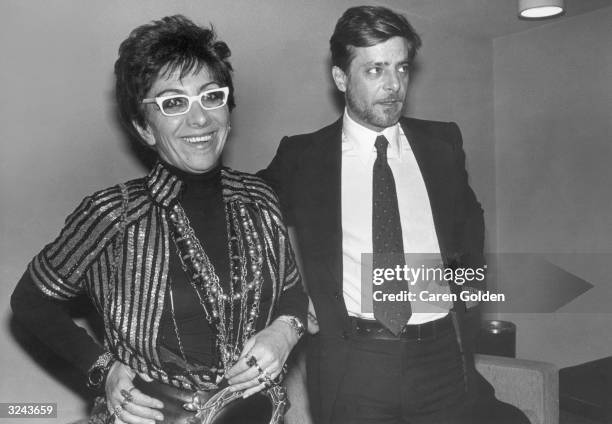 Italian film director Lina Wertmuller and Italian actor Giancarlo Giannini attend the American premiere of Wertmuller's film 'Seven Beauties' at...