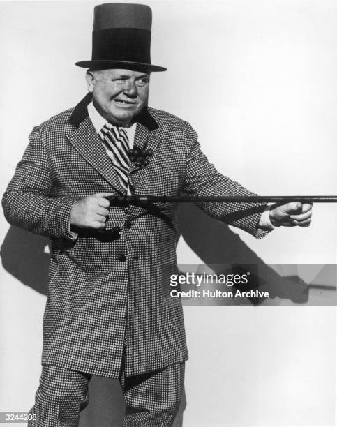 American actor Rod Steiger dressed as actor and comedian W.C. Fields, in a promotional portrait for director Arthur Hiller's film, 'W.C. Fields and...