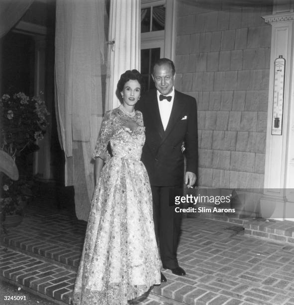 Chairman of American broadcasters CBS, Wiliiam S Paley pictured with his wife Barbara at Sarah Roosevelt's going away party at Greentree, held on...