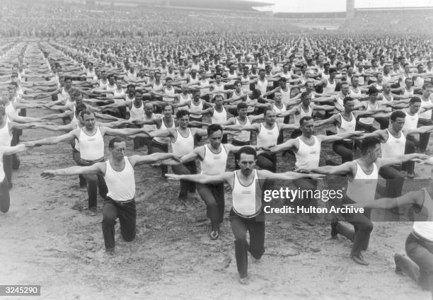 Members of SOKOL participate in a gymnastic exhibition at the open air stadium in Prague, Czechoslovakia.