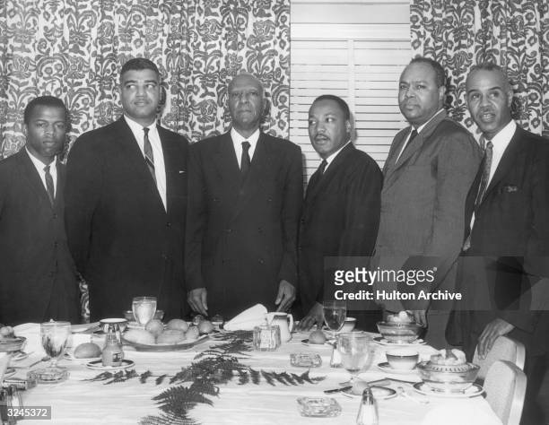 National civil rights leaders John Lewis, Whitney Young Jr., A. Philip Randolph, Dr. Martin Luther King, Jr., James Farmer and Roy Wilkins pose...