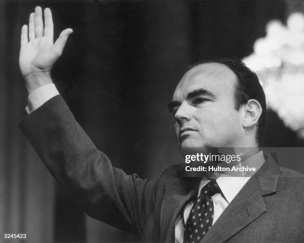 Nixon White House aide John Ehrlichman being sworn in before his testimony to the Senate Watergate Committee, Washington, D.C. In Ehrlichman's...