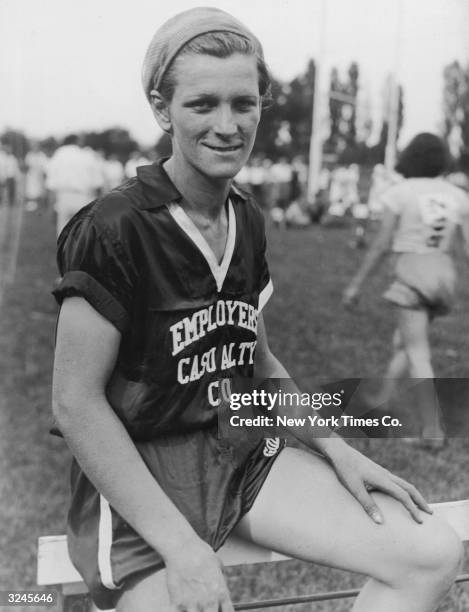 American athlete and olympic champion Mildred 'Babe' Didrikson Zaharias , wearing training clothes and a scarf. She triumphed in five events in the...