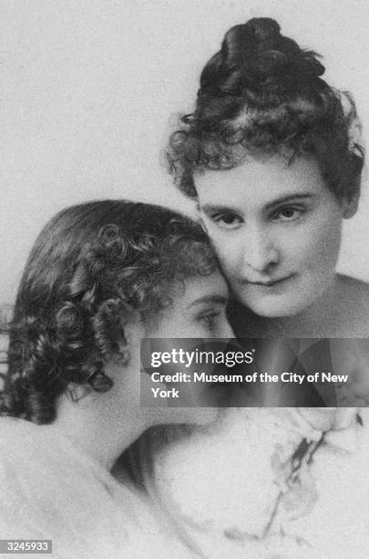 Headshot portrait of deaf, blind and mute writer Helen Keller , with her teacher and companion Anne M Sullivan . Keller wrote 'The Miracle Worker.'