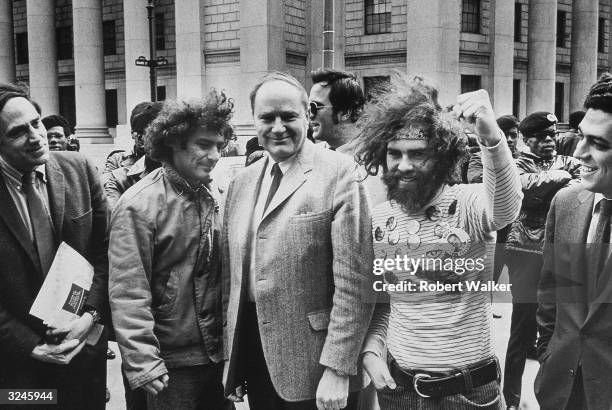 Attorney William Kunstler with members of the Chicago Seven, left to right, radical activists Abbie Hoffman , David Dellinger and Jerry Rubin ,...