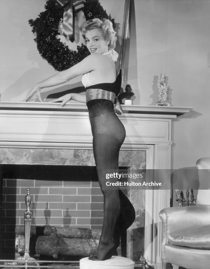 Marilyn Monroe Puts Up Christmas Stockings