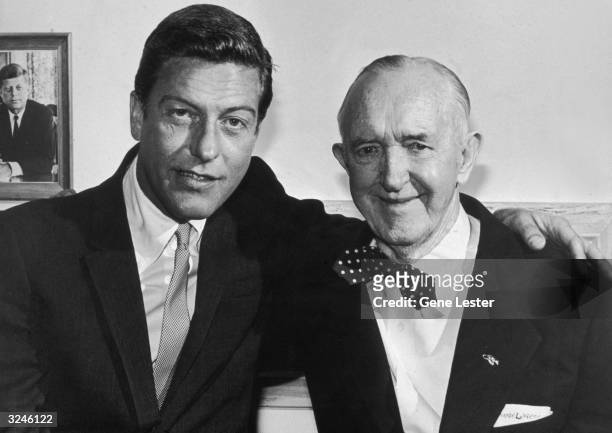 American comedians and actors Dick Van Dyke and Stan Laurel of the Laurel and Hardy comic team, pose together at the Oceana Motel in Santa Monica,...