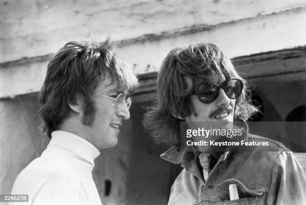Beatles John Lennon and George Harrison in Newquay while filming 'The Magical Mystery Tour'.