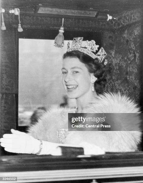 Queen Elizabeth II on the way to Westminster to preside at the first State Opening of Parliament ceremony since her accession to the throne.