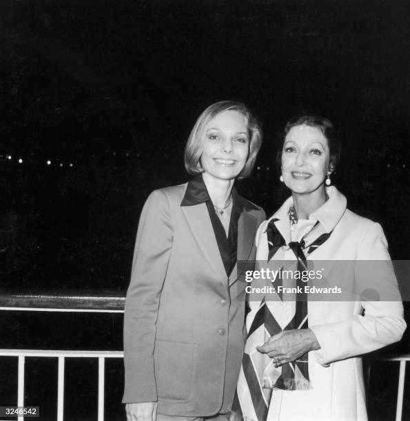 American actress Judy Lewis and her actress mother Loretta Young at an American Film Institute cocktail party held aboard the Pacific Princess cruise...
