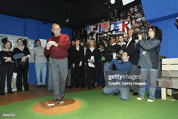 Don Zomer, Derek Jeter's high school coach from Kalamazoo Central High throws out the first pitch at the launch of a new interactive experience...