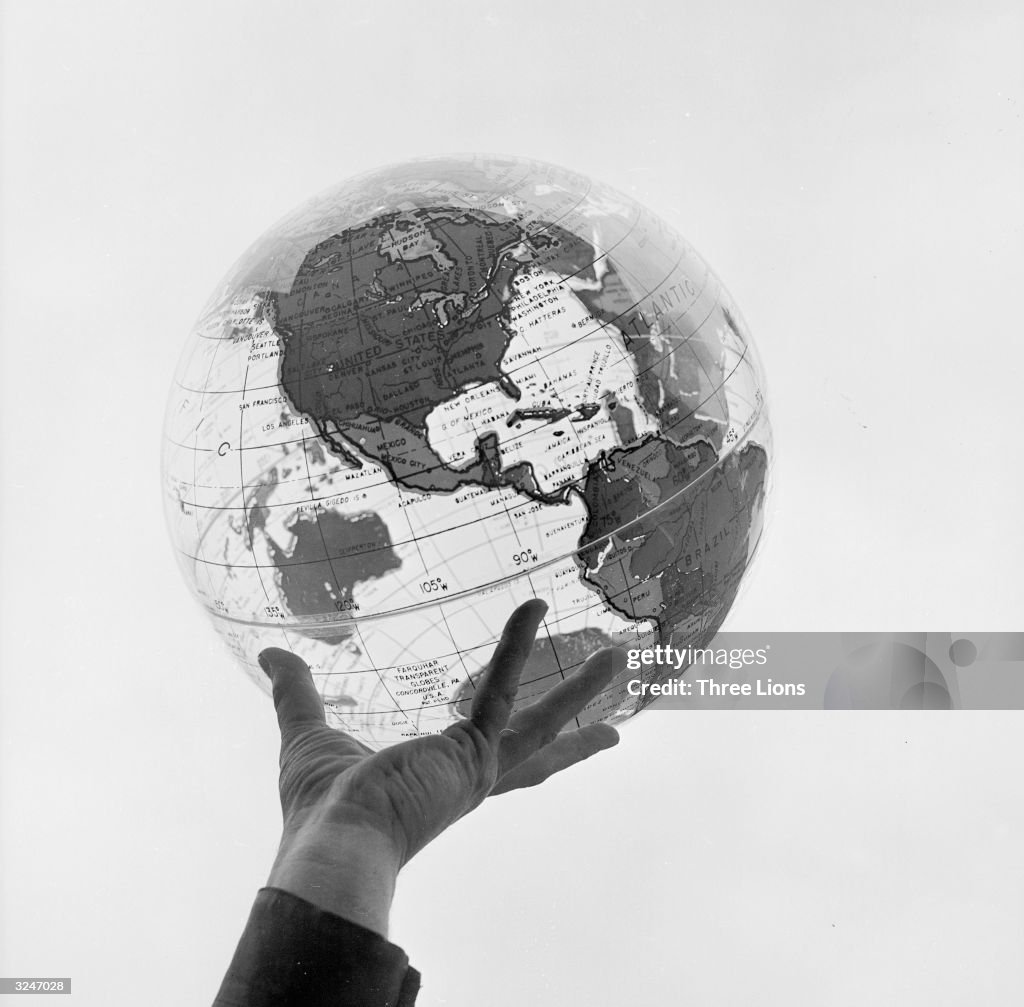 Hand Holding Globe