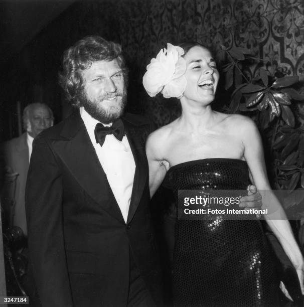 Married American actors Steve McQueen and Ali MacGraw attend the American Film Institute ceremony honoring actor James Cagney with its Life...