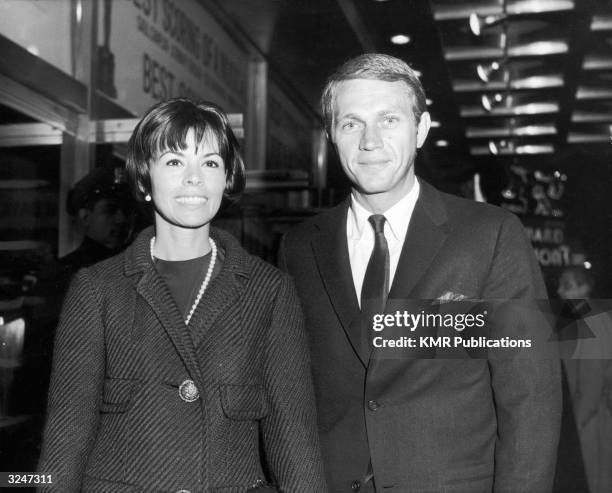 American actor Steve McQueen and his first wife, actor Neile Adams, smile as they attend a Broadway play, New York City.