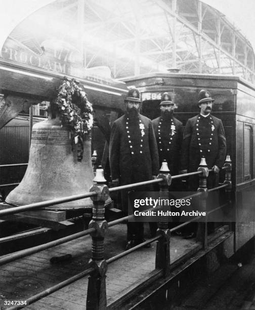 The Liberty Bell travels with guards aboard the Independence train from Independence Hall in Philadelphia to New Orleans, Louisiana, for a World...