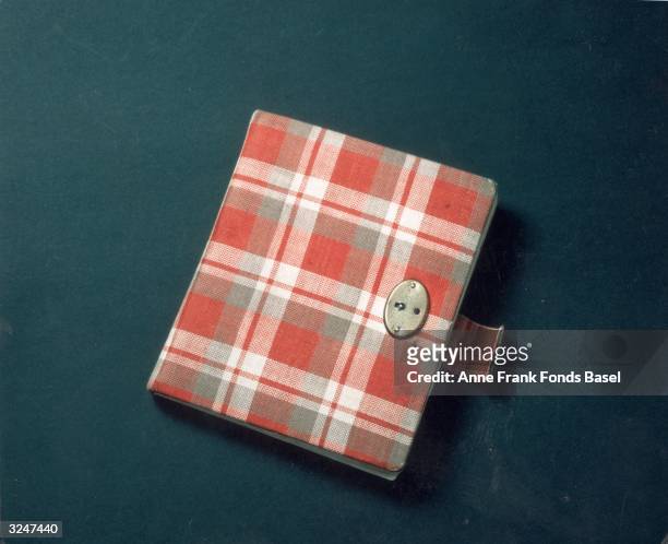 Anne Frank's red plaid diary, her first journal, in which she wrote from 1942 to 1944.