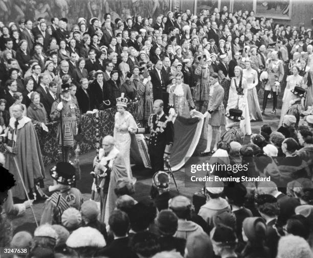 Queen Elizabeth II and Prince Philip return from the chamber after the state opening of Parliament.