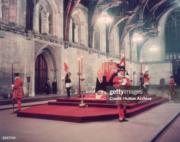 The body of King George VI lying in state in Westminster Hall, London, before being taken to St George's Chapel, Windsor, for burial. The coffin is...