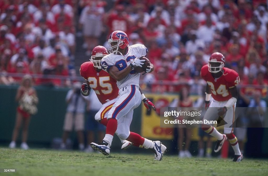 Andrew Reed Nfl Andre Reed of the Buffalo Bills in action against Dale Carter and ...