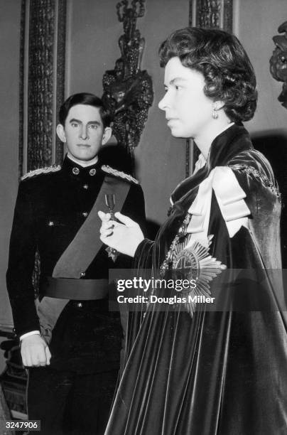 Waxwork of Prince Charles is placed beside that of his mother, Queen Elizabeth at Madame Tussauds. It was sculpted by Jean Fraser and is dressed in...