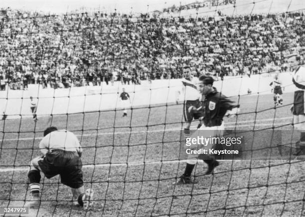 American goalkeeper Frank Borghi saves in front of Tom Finney during the England-USA match on June 29, 1950 in Belo Horizonte, Brazil, in which the...