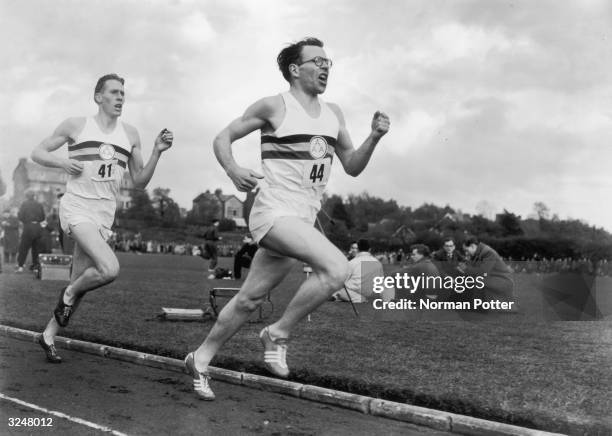 Chris Brasher takes the lead, closely followed by Roger Bannister during a historic race at Iffley Road, Oxford. This was the event which saw...