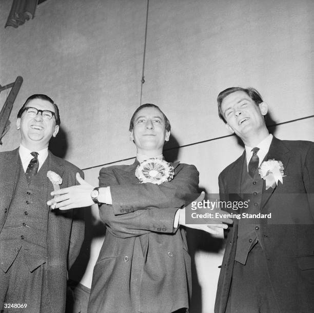 Eric Lubbock with Peter Goldman and Mr Jinkinson after Lubbock was elected MP for Orpington in Kent, winning the seat for the Liberal Party.