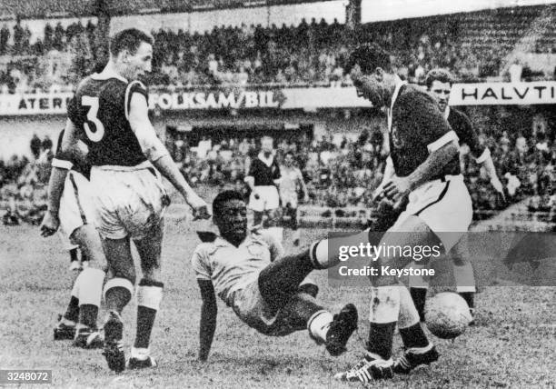 An incident in front of the Welsh goal during the Wales-Brazil World Cup match in Gothenburg, Sweden. The match ended in a 1-0 win for Brazil.