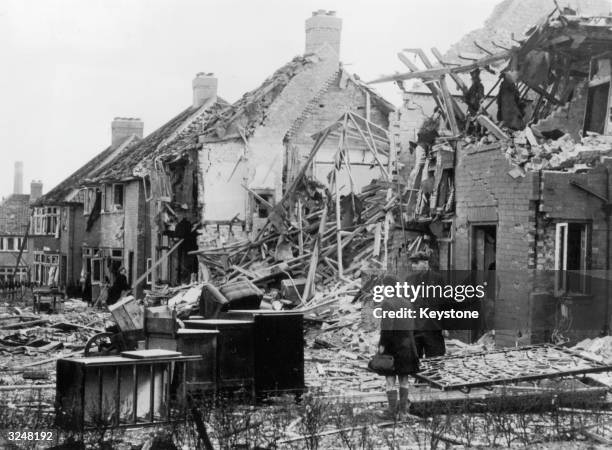 House in York is reduced to rubble by a World War II 'Baedeker' raid, one of a series of German air raids on British cities of cultural significance.