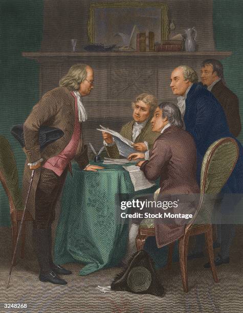 The drafting of the Declaration of Independence in Colonial America. From left to right: Benjamin Franklin, Thomas Jefferson, John Adams, Robert...