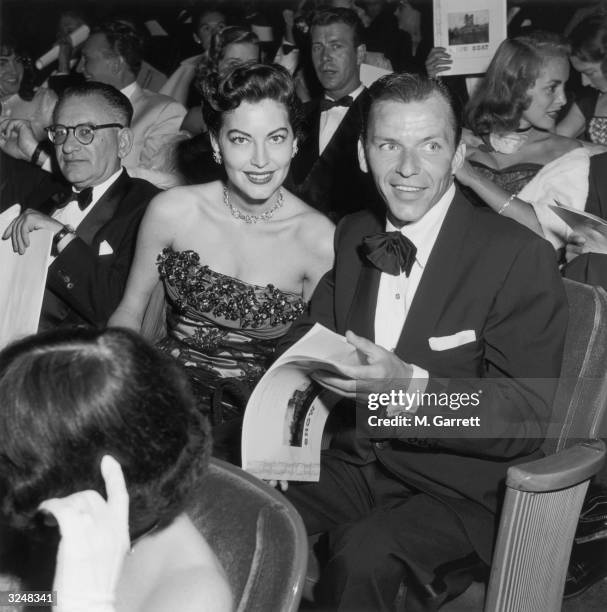 American actress Ava Gardner and her husband, American singer and actor Frank Sinatra at the Hollywood premiere of director George Sidney's film...