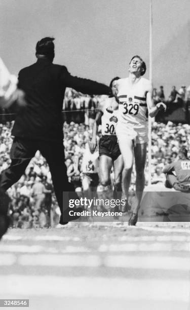 English athlete Roger Bannister winning the mile race at the Empire Games in Vancouver.