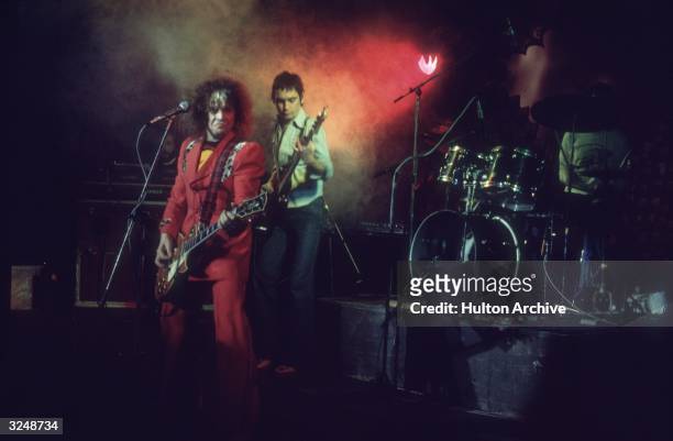 Glam rock star Marc Bolan and bassist Steve Curry on stage at the Lyceum Theatre in London.