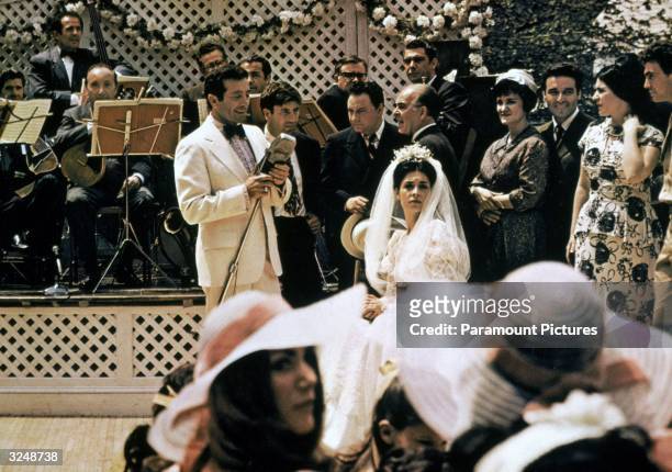 American singer Al Martino as Johnny Fontane sings to American actress Talia Shire playing the bride Constanzia in the wedding scene from director...