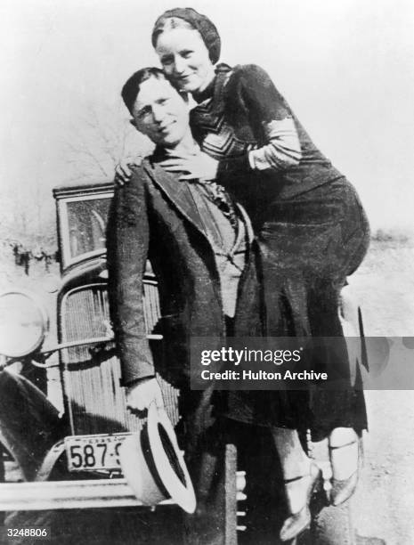 Portrait of American bank robbers and partners Clyde Barrow and Bonnie Parker , popularly known as Bonnie and Clyde, circa 1933.