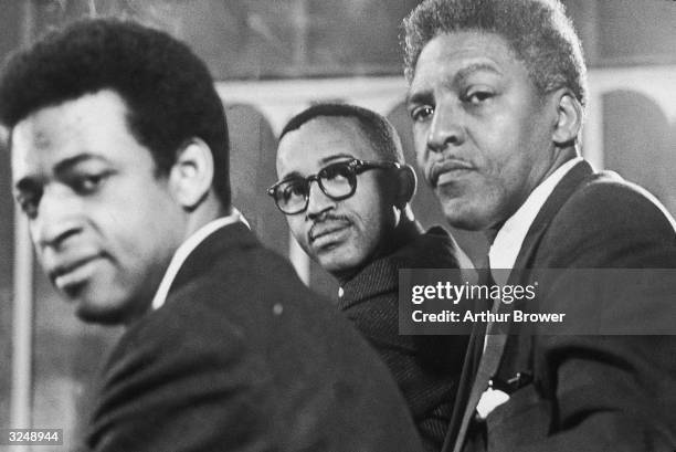 American civil rights activists Norman Hill, program director for C.O.R.E., Bayard Rustin , director of the March on Washington, and Frederick D....