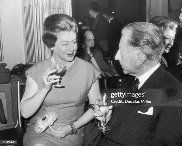 American millionaire J Paul Getty and Mary Teissier attend a party at the Cafe Royal on London's Regent Street, to celebrate the cafe's 100th...