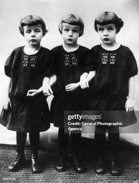 Roman Triplets Triplets In Dresses Photos and Premium High Res Pictures - Getty Images