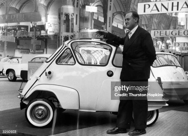 Bubble car pictured at the Paris Motor Show. Original Publication: Picture Post - 8714 - Cars For 1957 - pub. 1956