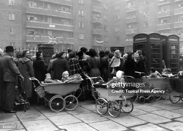 Housewives watching Princess Margaret at the opening of the final flats on the Tachbrook estate at Westminster, London.