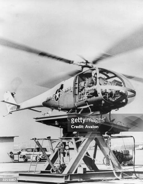The Lockheed KH-51A Helicopter undergoes a tilt test on dry land to emulate conditions encountered when landing on a destroyer at sea.